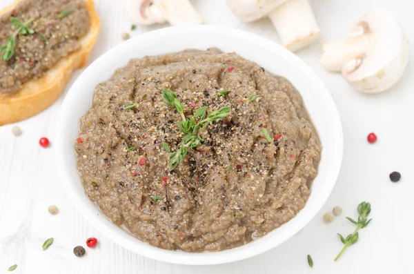 Mushroom pate in a bowl close-up top view — Stock Photo, Image