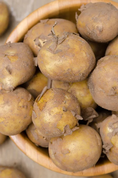 New potatoes in a bowl, top view — Stock Photo, Image