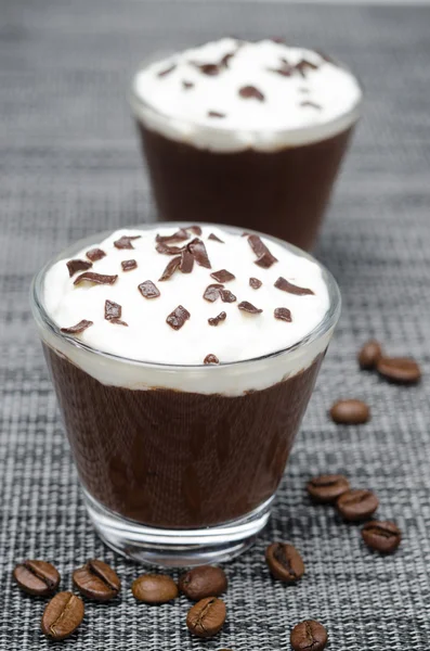 Two glasses of chocolate and coffee mousse with whipped cream — Stock Photo, Image