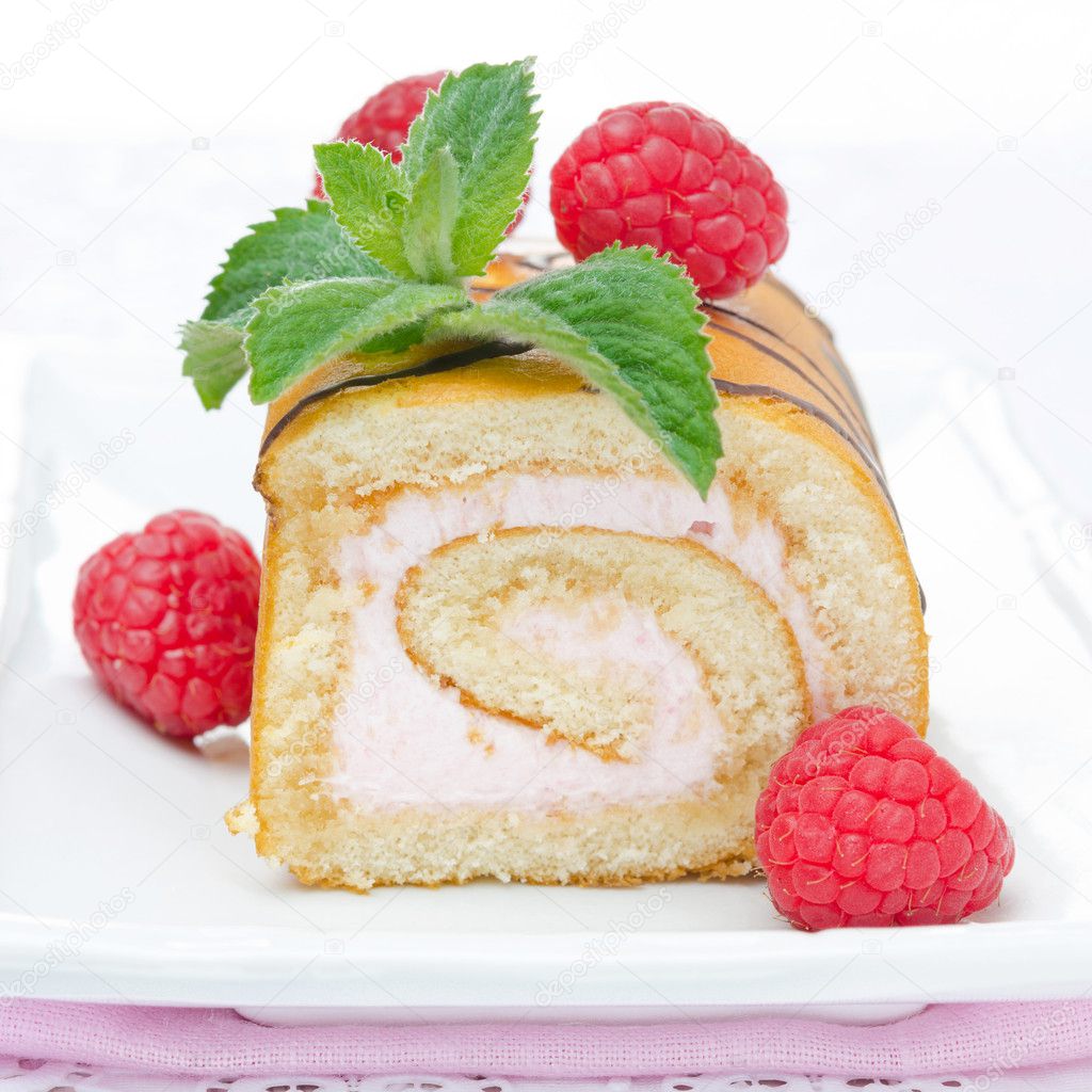 swiss roll with raspberry cream, close-up
