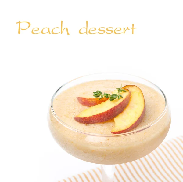 Peach souffle in glass, isolated on white, close-up — Stock Photo, Image