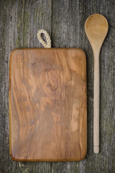 Vintage cutting board with space for text and spoon — Stockfoto