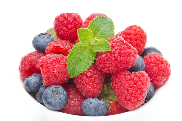 Fresh berries (raspberries, blueberries, strawberries) in a bowl — Stock Photo, Image