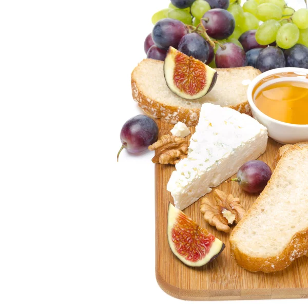 Snacks - ost, bröd, fikon, druvor, honung och nötter — Stockfoto