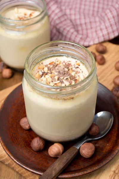 Chocolate and coffee yogurt with nuts in portions — Stock Photo, Image