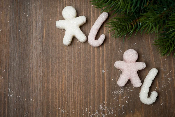 Vánoční pozadí s cukru malí muži — Stock fotografie