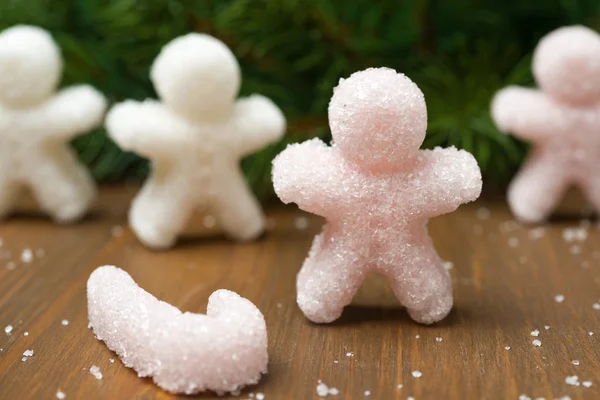 Azúcar multicolor en forma de personas pequeñas —  Fotos de Stock