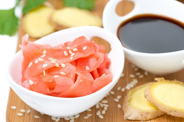 Asian ingredients fresh and pickled ginger, soy sauce and sesame — Stock Photo, Image