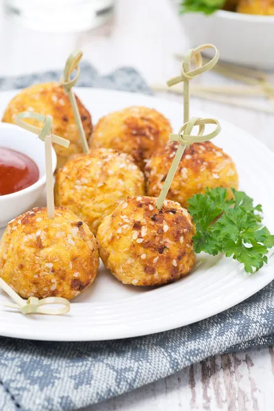 Chicken meatballs in breading with tomato sauce, closeup — Stock Photo, Image