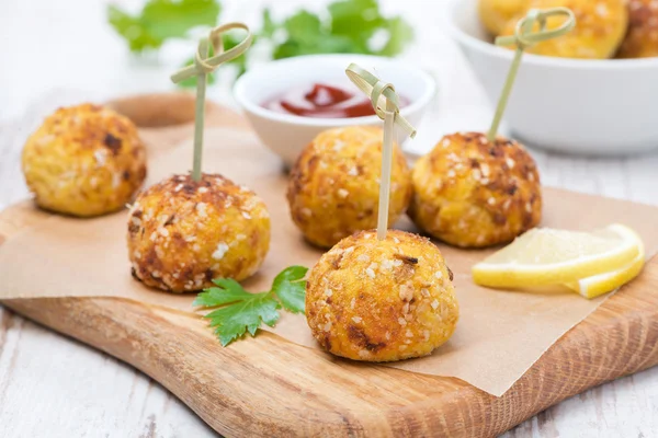 Chicken meatballs in corn breading with tomato sauce — Stock Photo, Image