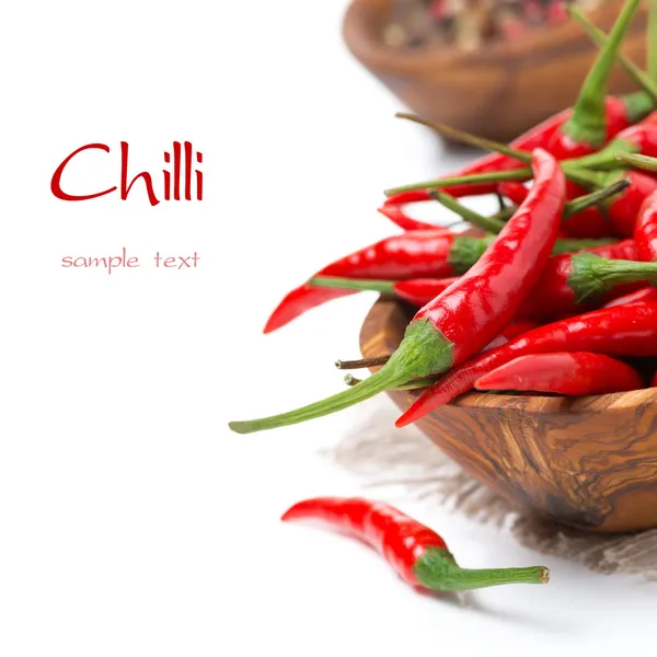 Bowl with fresh chili peppers, selective focus, isolated — Stock Photo, Image