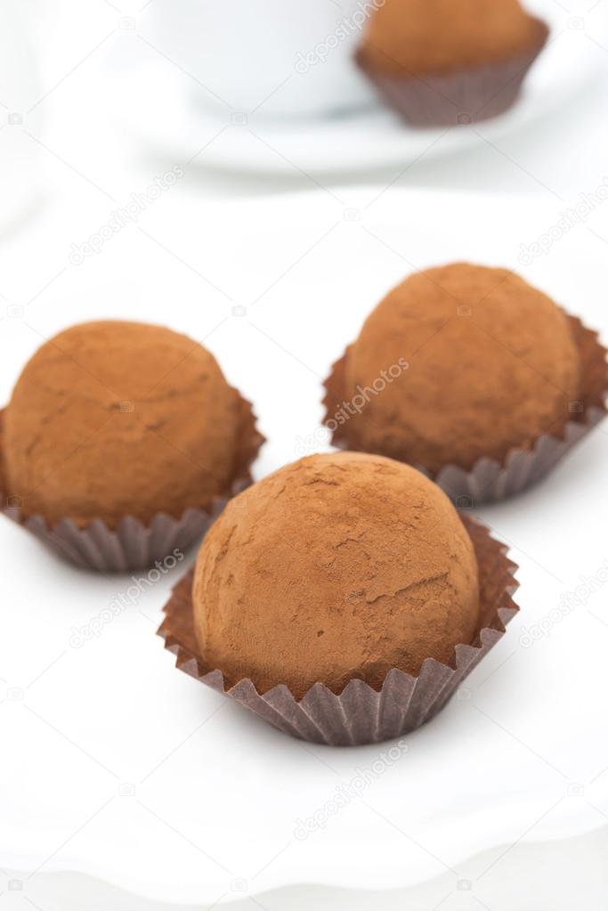 chocolate truffles on a white background, close-up