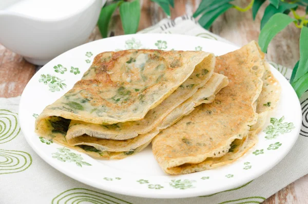 Crepes with spinach on a plate — Stock Photo, Image