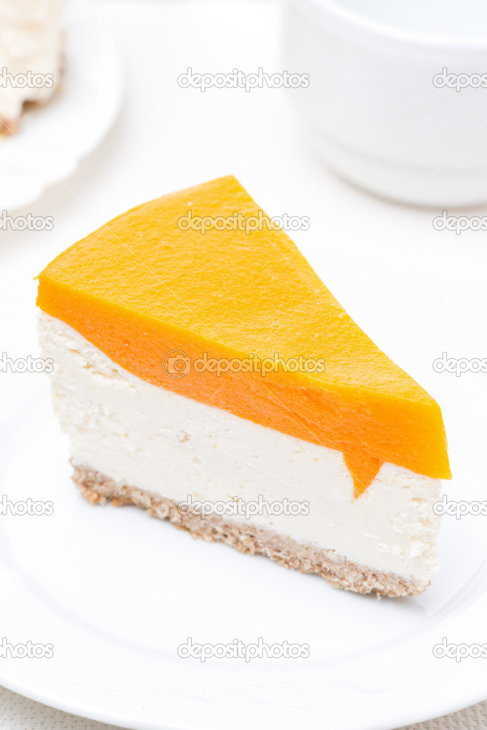 piece of cheesecake with pumpkin jelly, vertical
