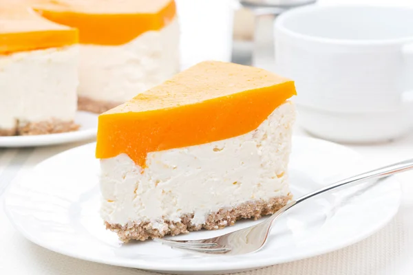 Piece of cheesecake with pumpkin jelly — Stock Photo, Image