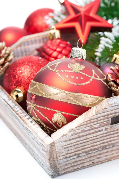 Wooden box with Christmas decorations, close-up — Stock Photo, Image