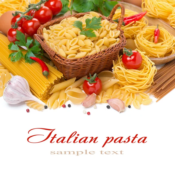Assorted Italian pasta, cherry tomatoes, herbs and spices — Stock Photo, Image
