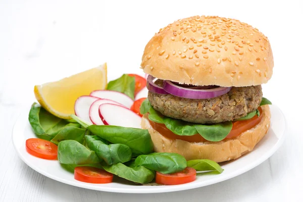 vegetarian burger with fresh salad