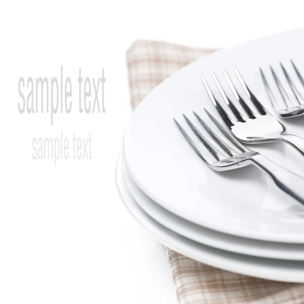 Talerze i widelce - naczynia do serwowania, na białym tle — Zdjęcie stockowe