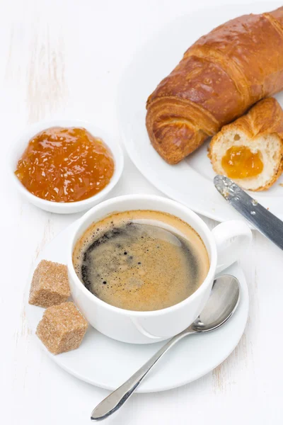 Fresh breakfast with black coffee, croissants and orange jam — Stock Photo, Image