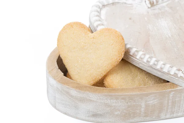 Wooden box with cookies in the form of heart, isolated — Stock Photo, Image