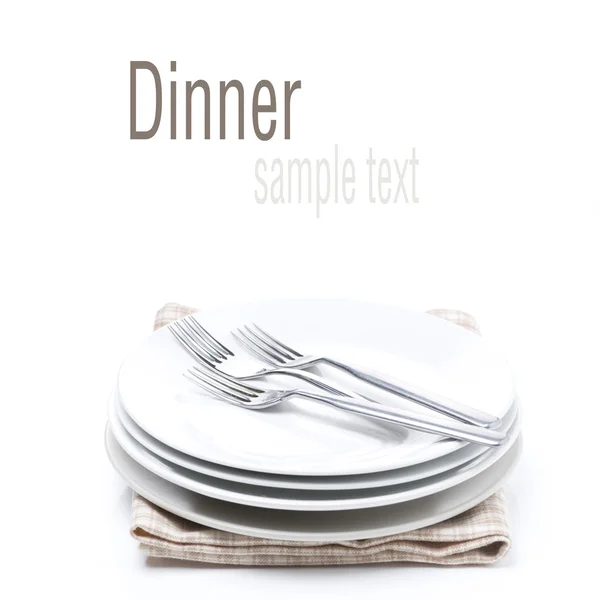 Tableware for dinner - plates and forks, isolated — Stock Photo, Image