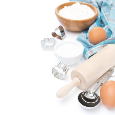 Rolling pin, measuring spoons, cookie cutters