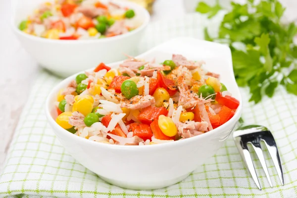 Colorful salad with corn, green peas, rice, red pepper and tuna Royalty Free Stock Photos