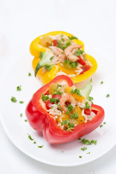 Stuffed peppers with salad of rice and shrimp on the plate — Stock Photo, Image
