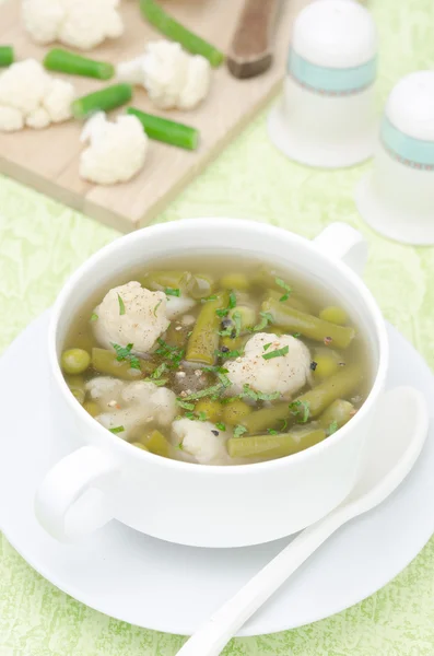 Vegetable soup with cauliflower and green beans vertical — Stock Photo, Image