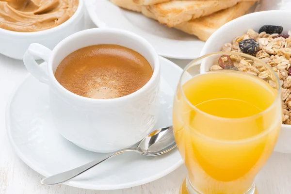 Freshly brewed espresso, orange juice and muesli for breakfast — Stock Photo, Image