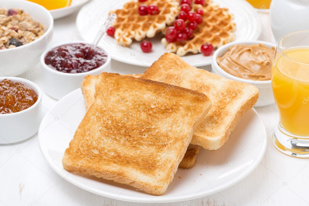 continental breakfast - toast, jam, peanut butter, juice