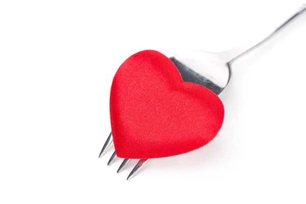 Red heart on a fork, close-up, isolated — Stock Photo, Image