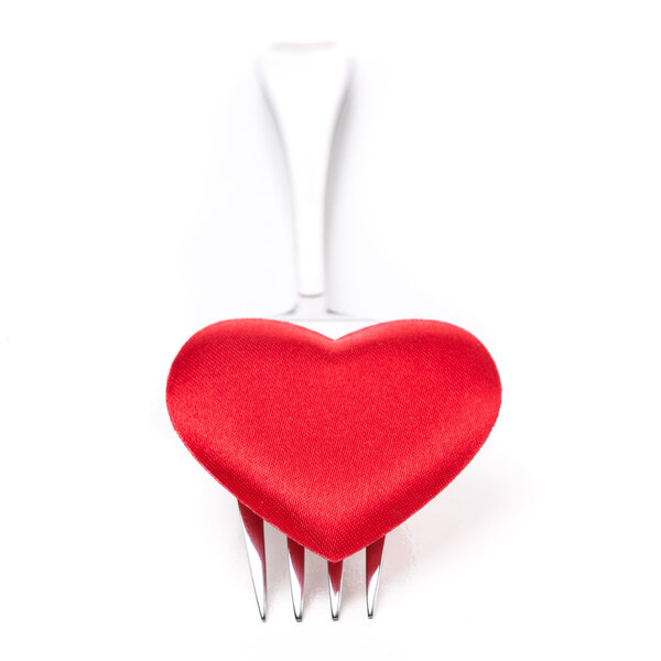 red heart on a fork, isolated