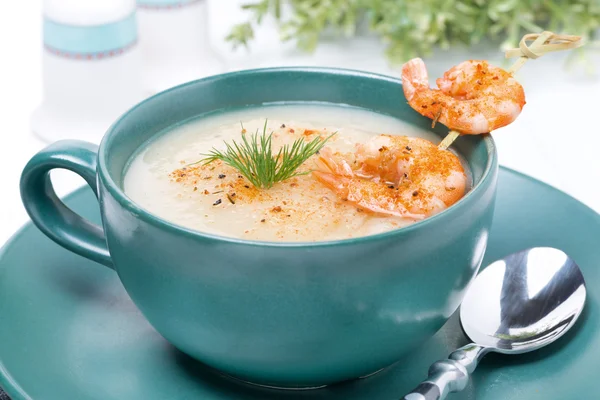 Potato cream soup with shrimps on a skewer, close-up — Stock Image Potato cream soup with shrimps on a skewer, close-up Royalty Free Stock Images