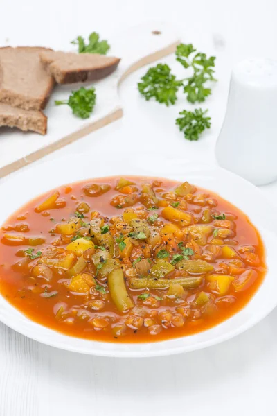 Tomato soup with green lentils and vegetables, vertical — Stock Photo, Image