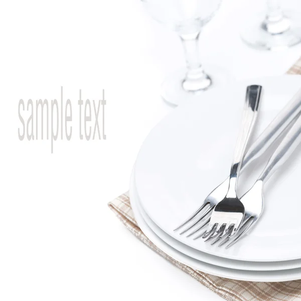 Tableware for dinner - plates, forks and glasses — Stock Photo, Image