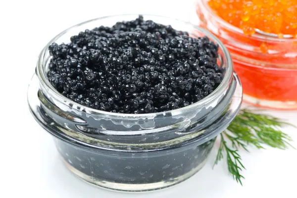 Black caviar in a glass jar, close-up, isolated — Stock Photo, Image