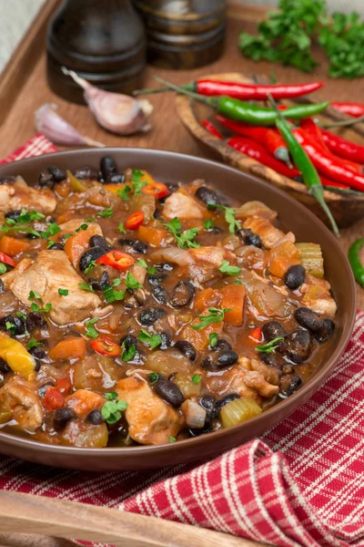 Chili with black beans, chicken and vegetables, vertical — Stock Photo, Image