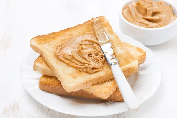 Toast with peanut butter — Stock Photo, Image