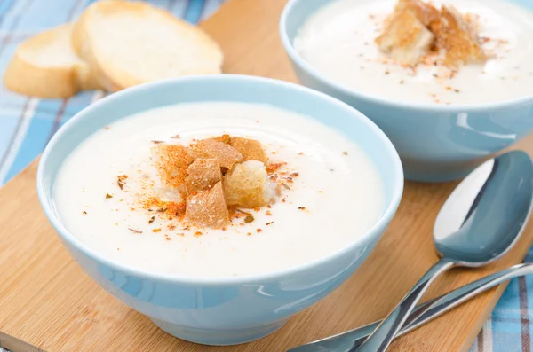 Two bowls of cold cauliflower soup with cottage cheese — Stock Photo, Image