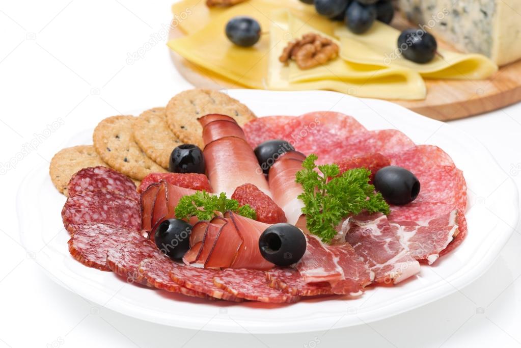 assorted deli meats and a plate of cheese, close-up