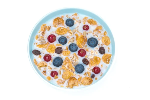 Muesli with fresh berries and milk, top view, isolated — Stock Photo, Image