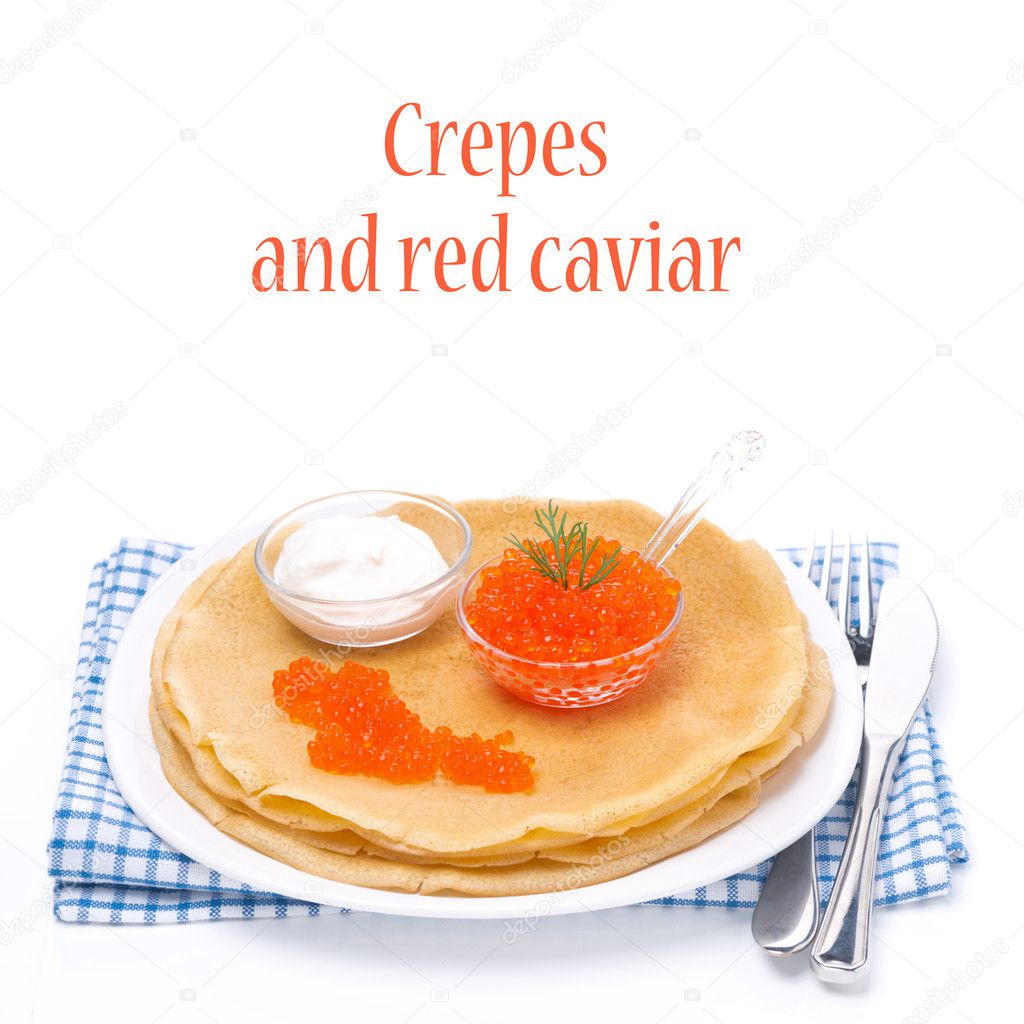 traditional crepes with red caviar and sour cream, isolated