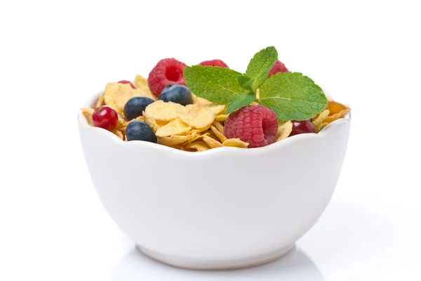 Bowl of cornflakes with fresh berries and mint, isolated — Stock Photo, Image