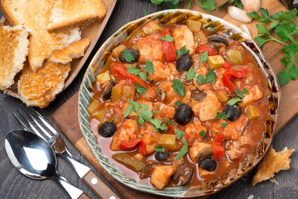 Fish stew in tomato sauce on a plate, top view ⬇ Stock Photo, Image by