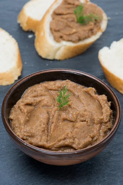 Pate of chicken liver and roasted peppers in a bowl, vertical — Stock Photo, Image