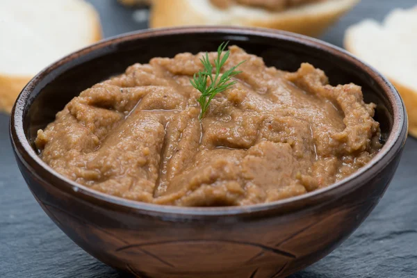 Pate of chicken liver and roasted peppers in a bowl, close-up — Stock Photo, Image