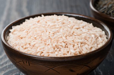 pink rice in ceramic bowl, close-up