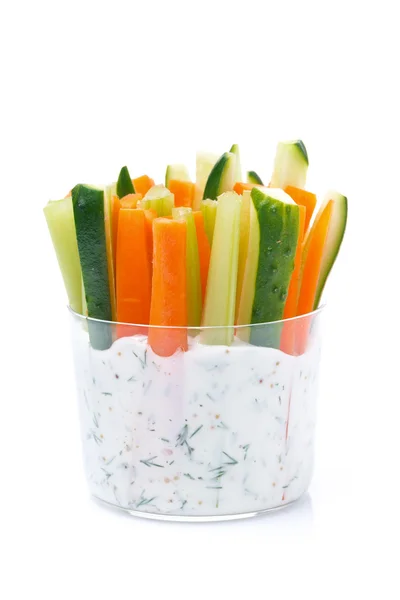 Fresh vegetables in a yoghurt sauce in a glass, isolated — Stock Photo, Image